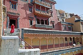 Ladakh - Tikse gompa, the main monastery halls with the characteristc red painted windows and woden balconies